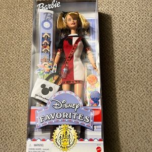 Disney exclusive Barbie.  Never been out of box.  Box has a crinkle as…